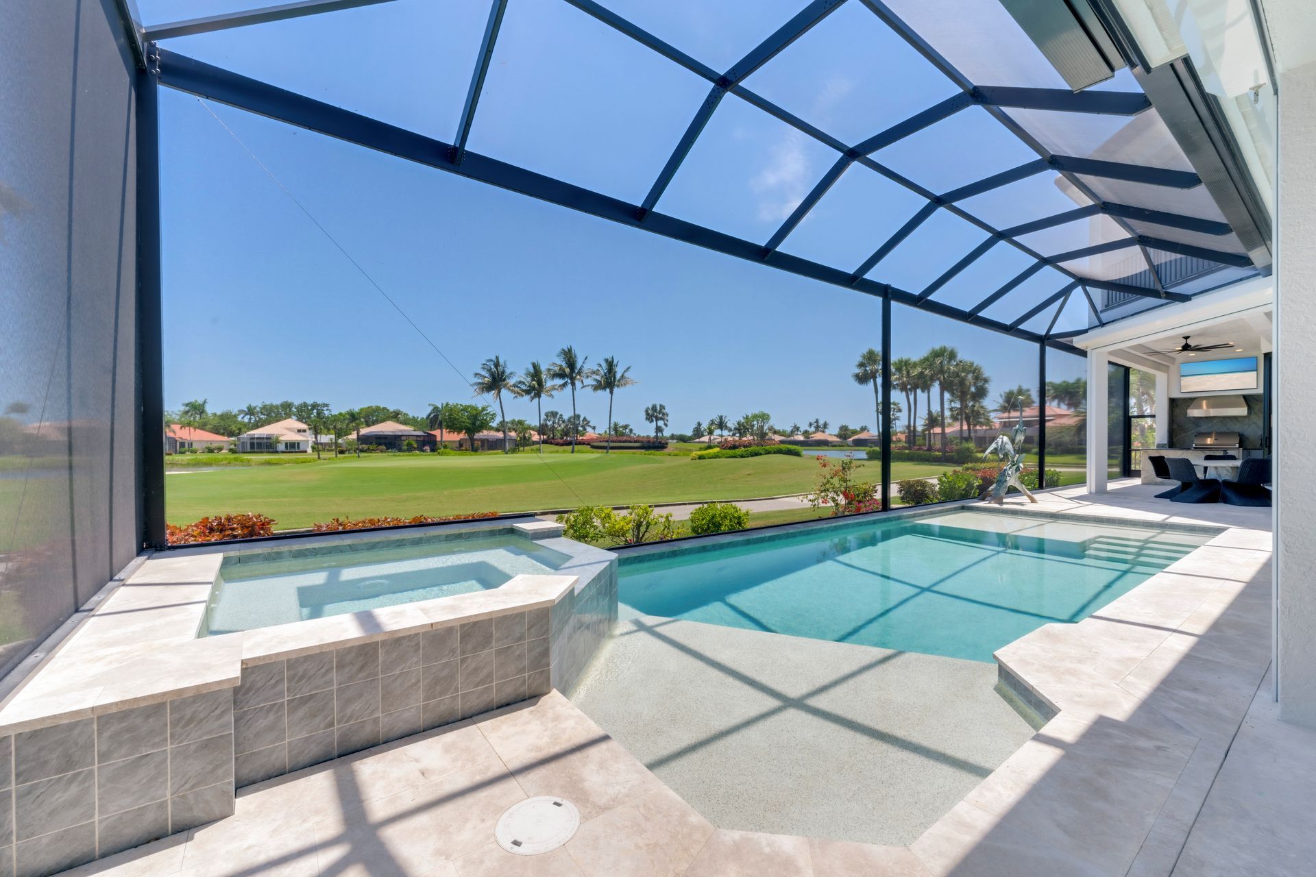 There is a large swimming pool in the middle of the house.