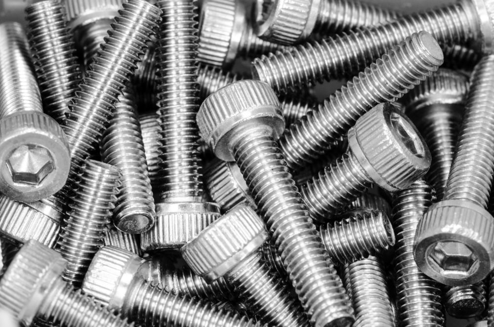 A Pile Of Stainless Steel Screws And Bolts — Illawarra Fasteners Pty Ltd In Unanderra, NSW