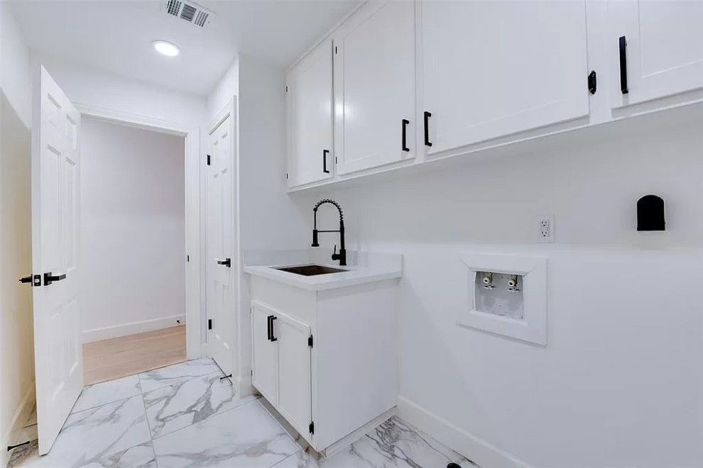 Laundry room remodeling and cabinet installation by SPS Remodeling in Conroe Texas