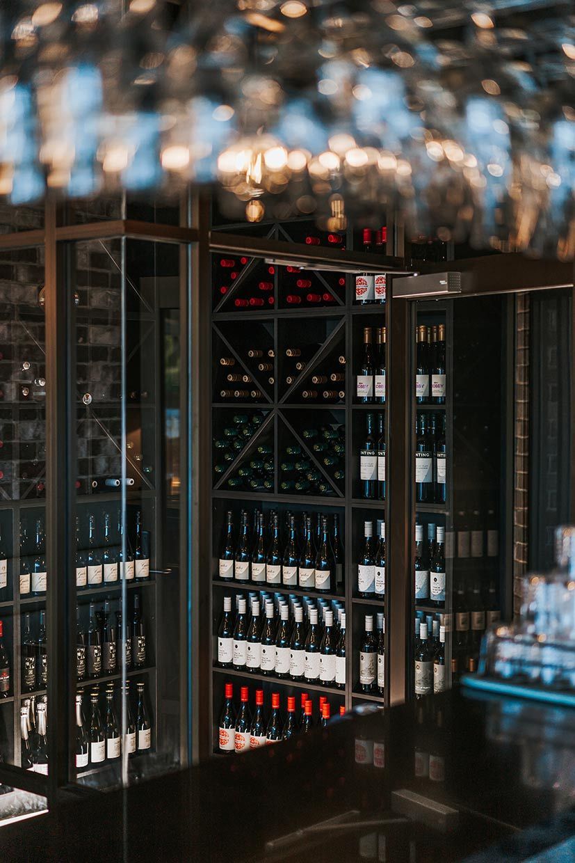A Wine Cellar Filled With Lots of Bottles of Wine — Fedeles East Gosford in East Gosford, NSW