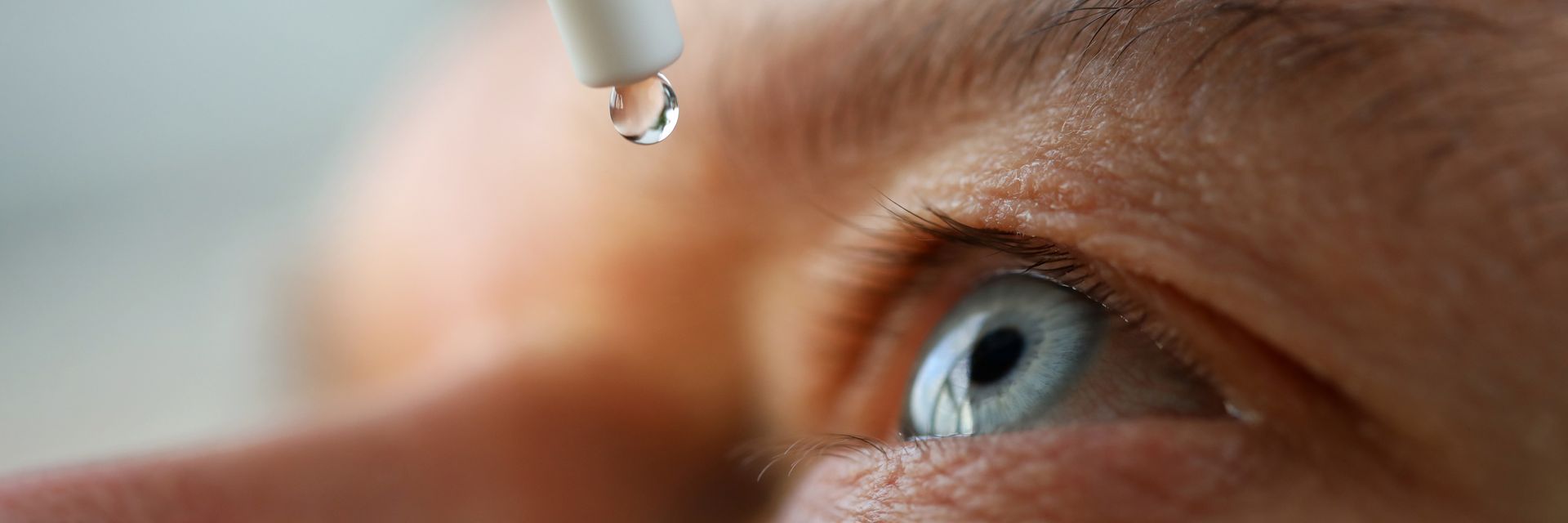 Eye care products for men showcasing eye diseases treatment, representing lens relief. Eye care products for men showcasing eye diseases treatment, representing lens relief.
