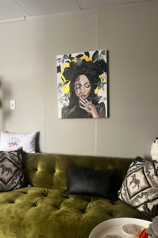 Hands on your health new office location with the green couch and painting above the couch