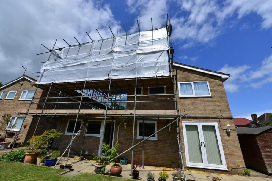 A House With Scaffolding on the Side of It — RM Scaffolding Solutions in Evans Head, NSW