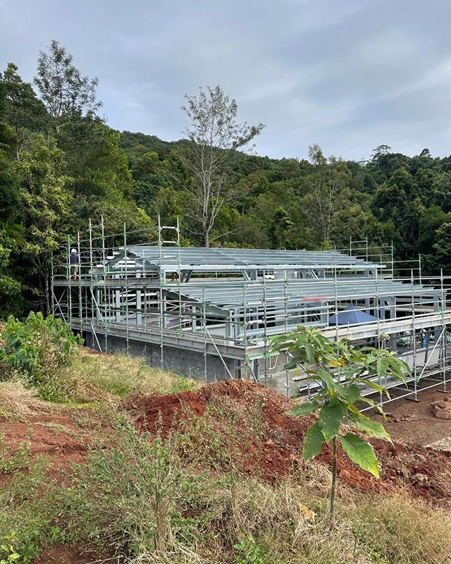 A Large Building is Being Built in the Middle of a Forest — RM Scaffolding Solutions in Lennox Head, NSW