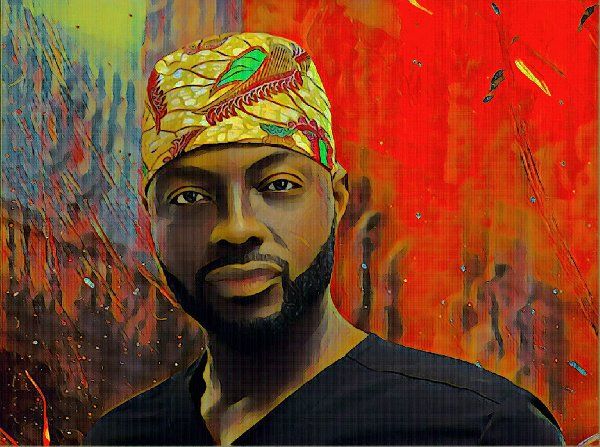 A man with a beard is wearing a surgical cap.