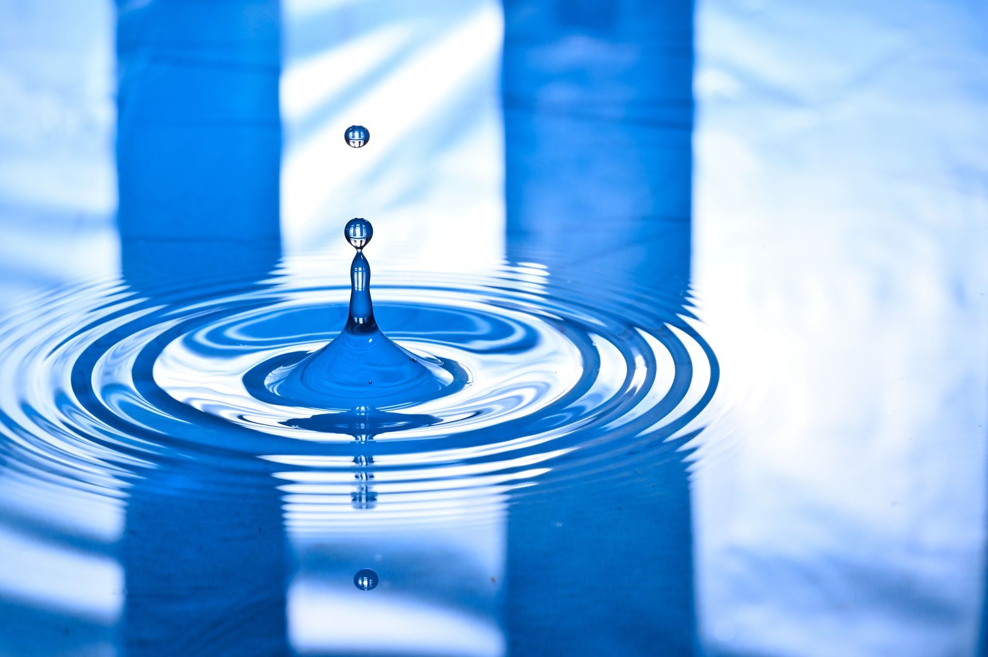 Water drop representing need to inspect a water filtration system in a Virginia home during summer.