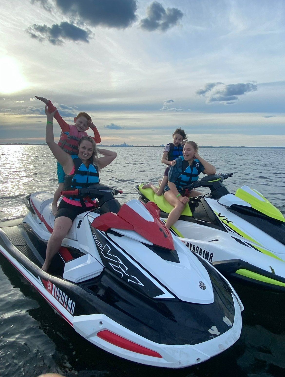 beautiful sunset and man riding on jet ski