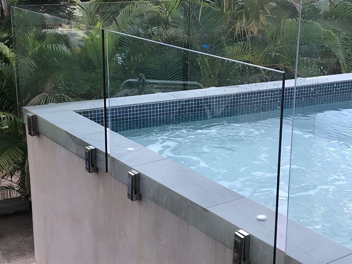 Modern Seamless Face-mount Glass Railing — Top Shelf Glass Pool Fencing & Balustrading in Merrimac, QLD