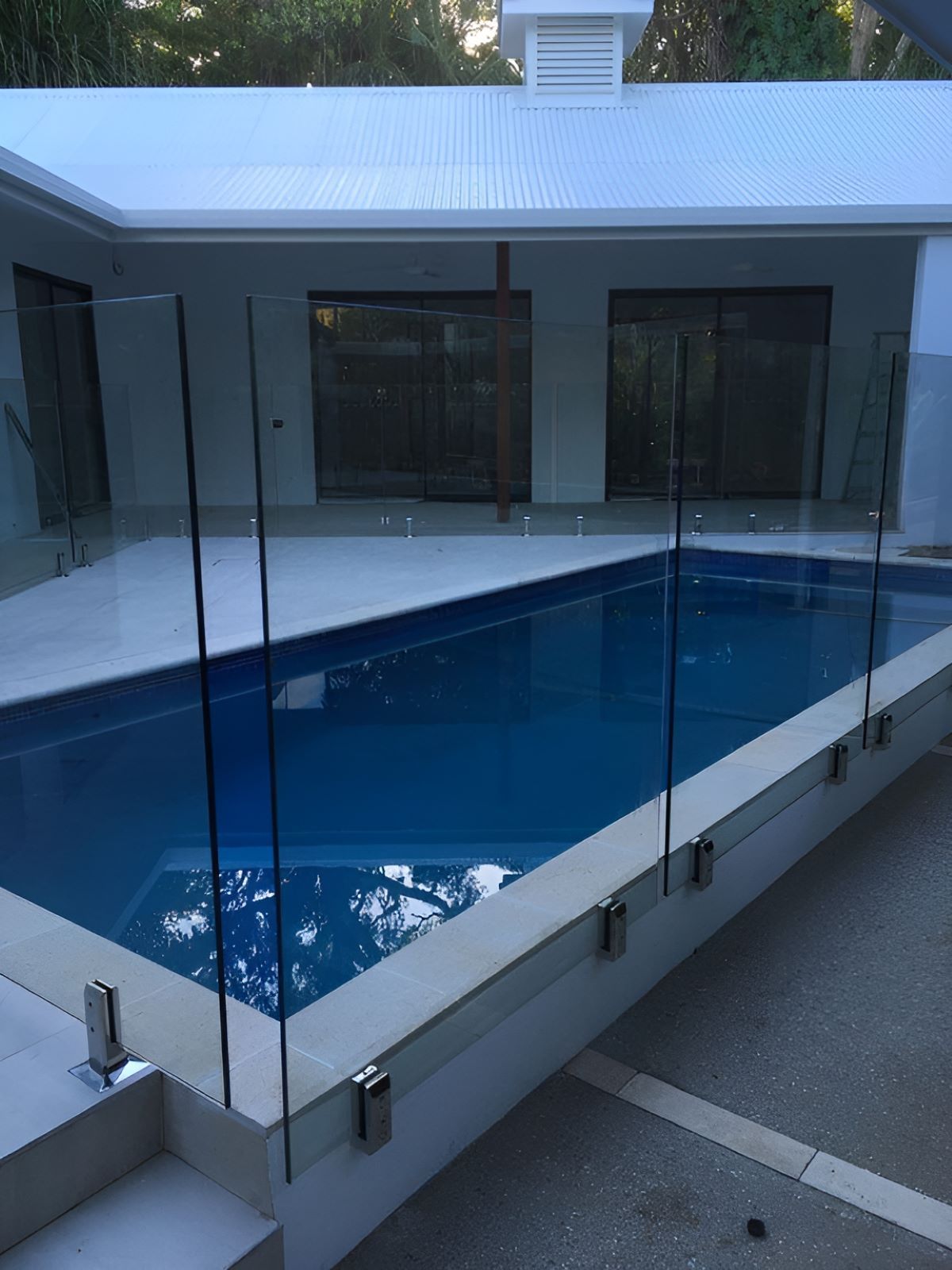 Frameless Glass Fence With Standoffs — Top Shelf Glass Pool Fencing & Balustrading in Merrimac, QLD