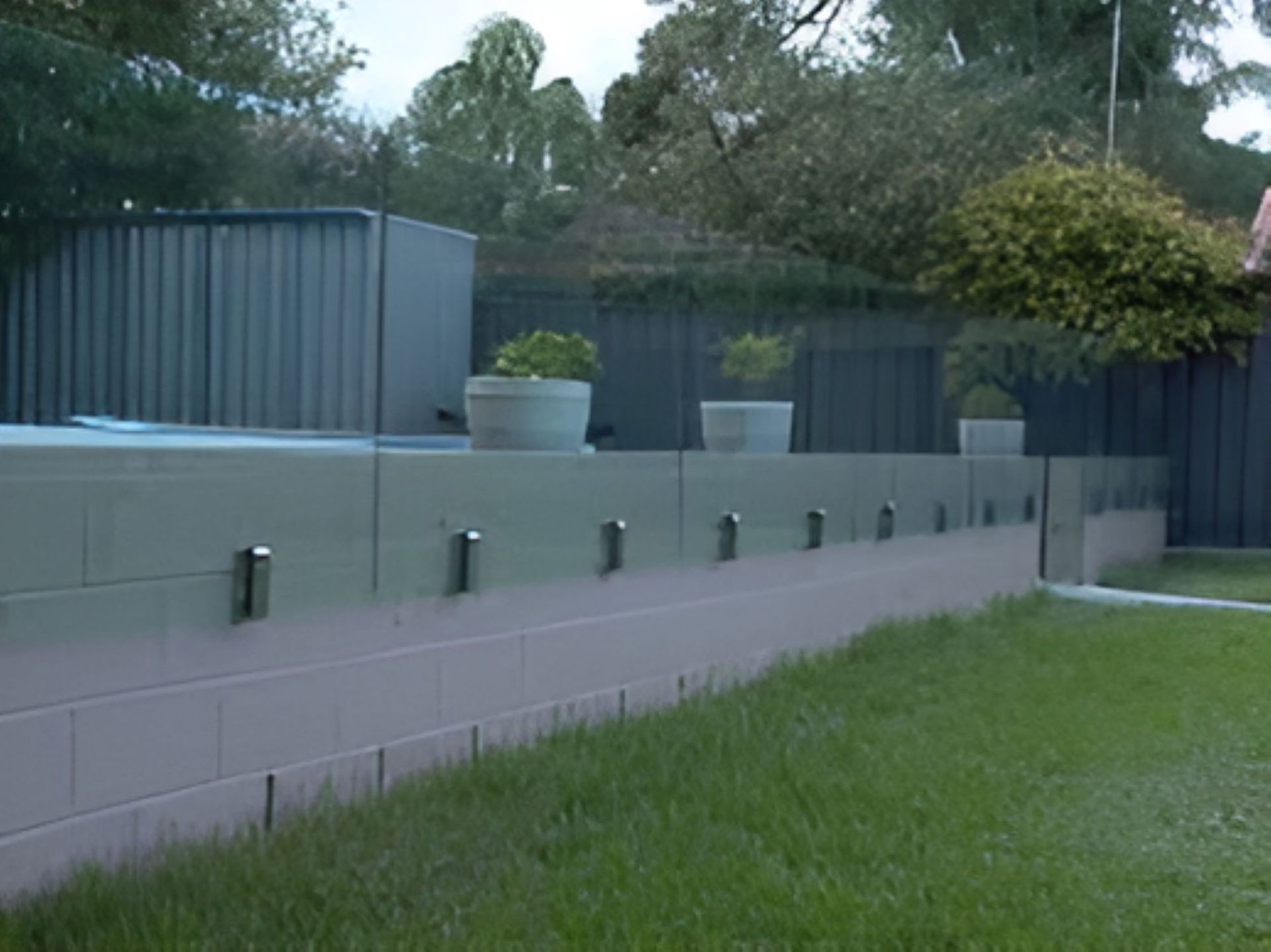 Glass Railing With Secure Standoffs — Top Shelf Glass Pool Fencing & Balustrading in Merrimac, QLD