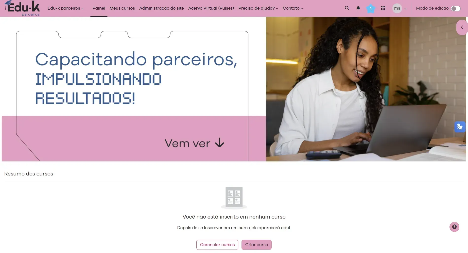 Woman at desk using laptop, with text