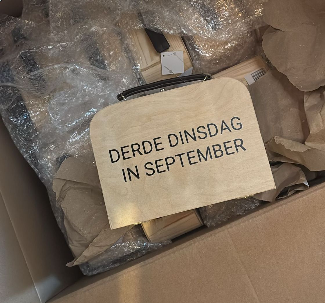 foto koffertje met derde dinsdag in september erop