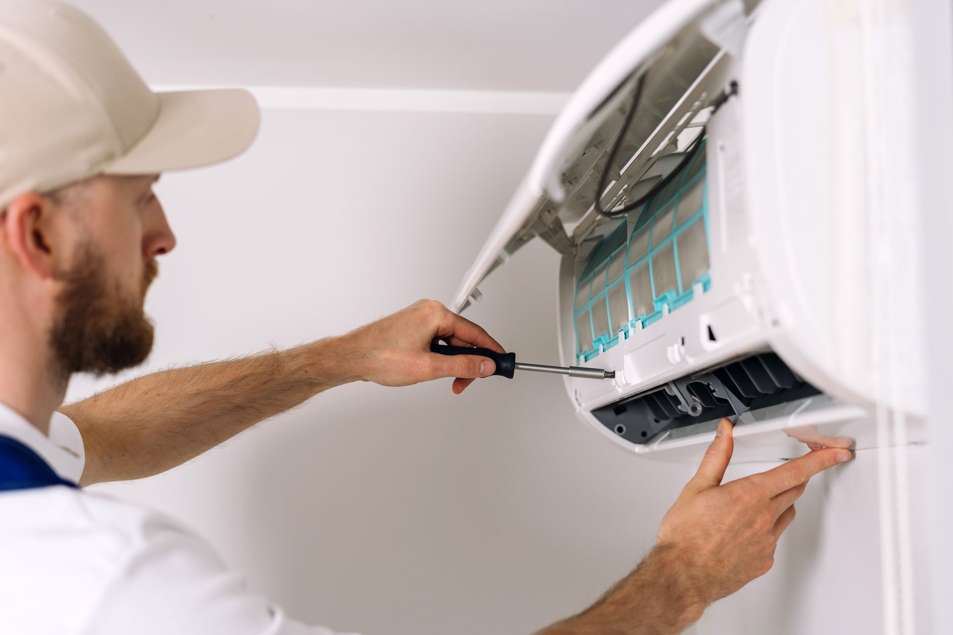 Expert maintenance service for air conditioning unit in residential apartment