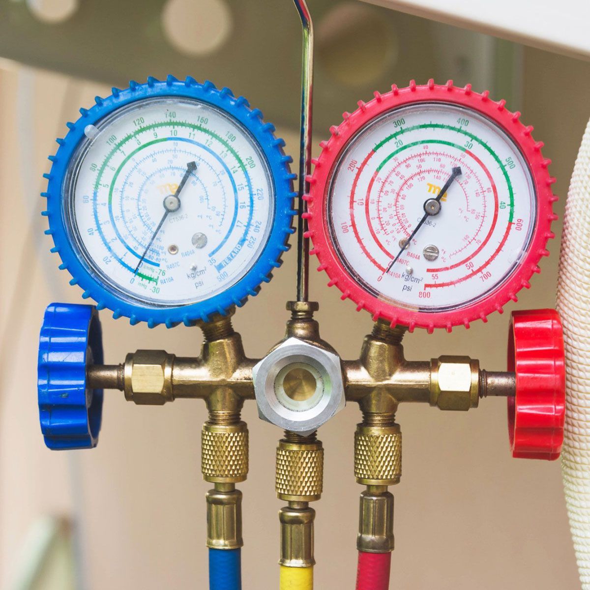 A close up of two pressure gauges on a valve Commercial Heating Services Flint MI
