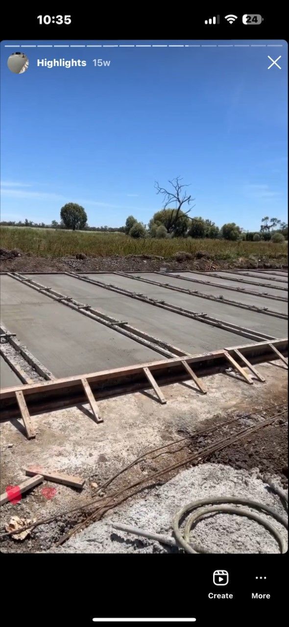 Men Working on a New Concrete Driveway — Civil Contractors in Inverell