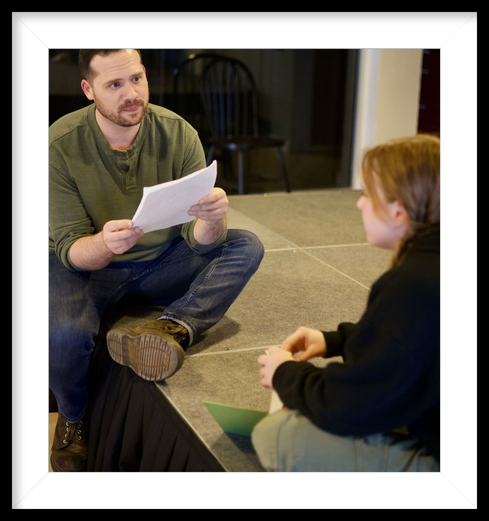 Talent development coach providing performance feedback during acting class for film and television careers
