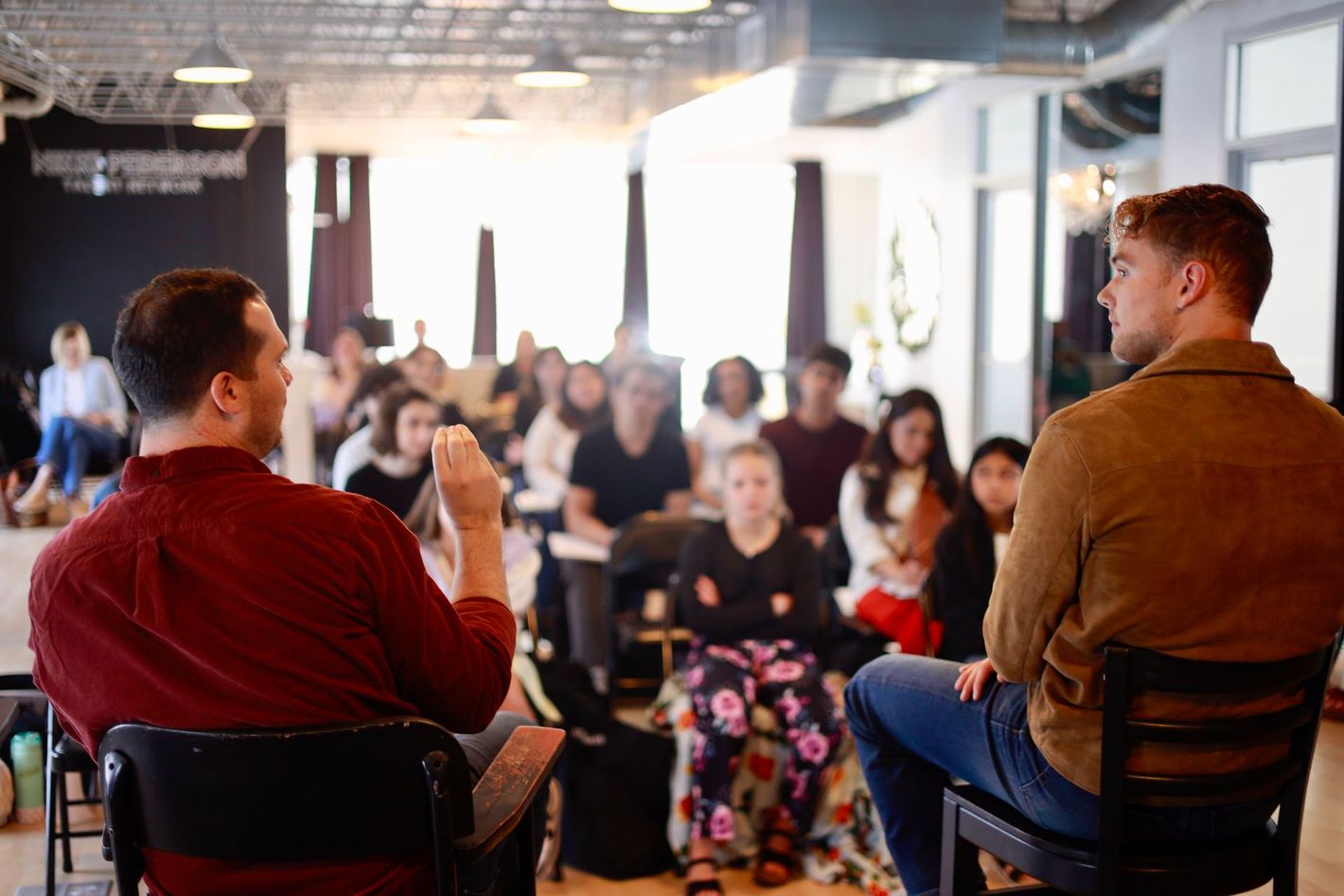 Group of performers training in acting workshop focused on confidence, camera presence, and audition preparation
