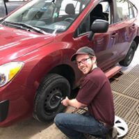 Changing Vehicle Tire in Evans City, PA - Skander Tire & Auto Service