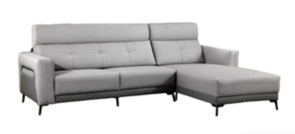 A grey couch and a black and white chair on a white background.