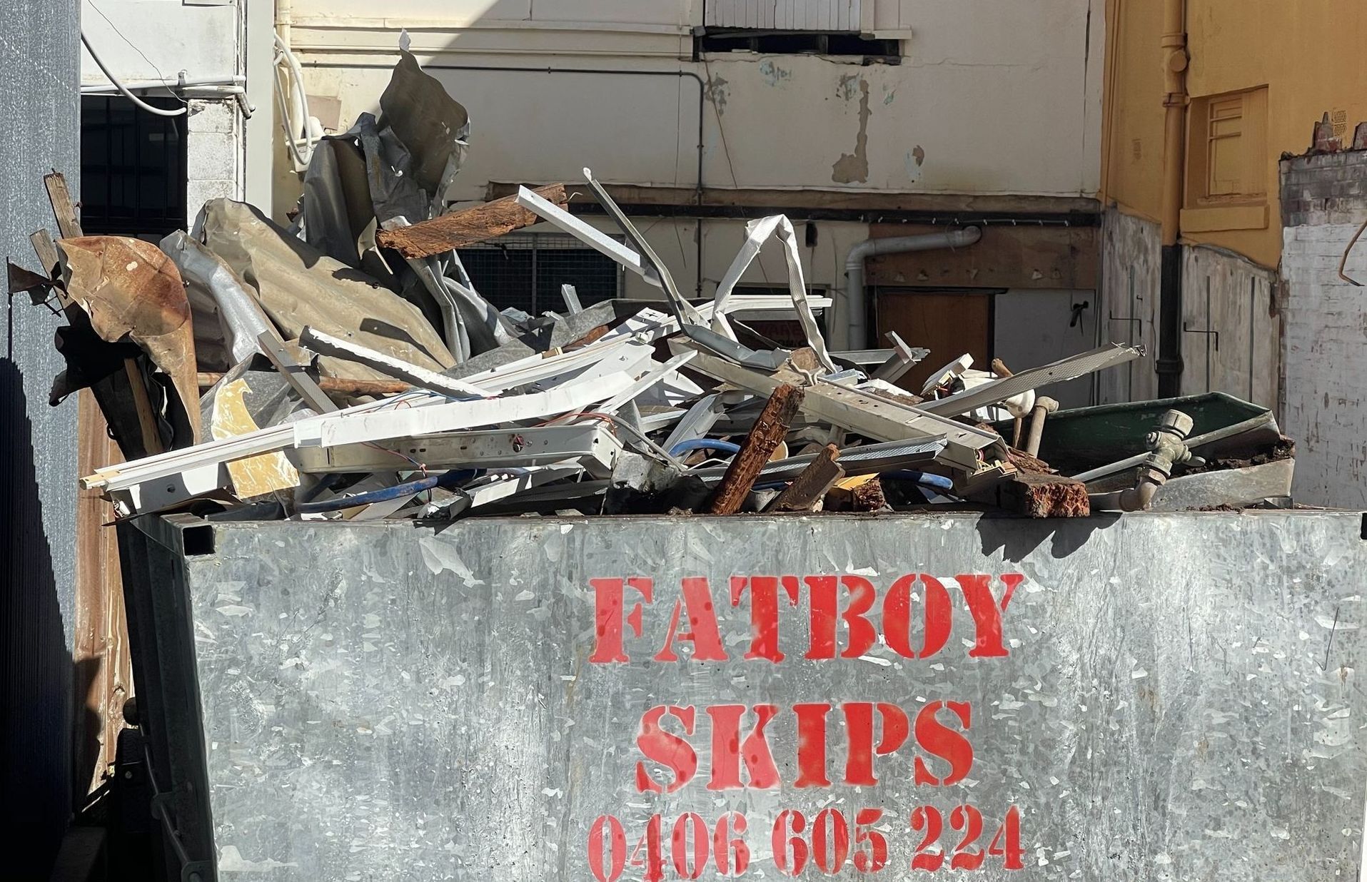 A Skip Bin With A Logo Fatboy Skips — Fat Boy Skips Townsville In Nome, QLD