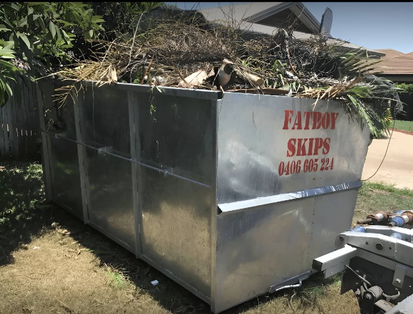 A Skip Bin With A Logo Fatboy Skips — Fat Boy Skips Townsville In Nome, QLD