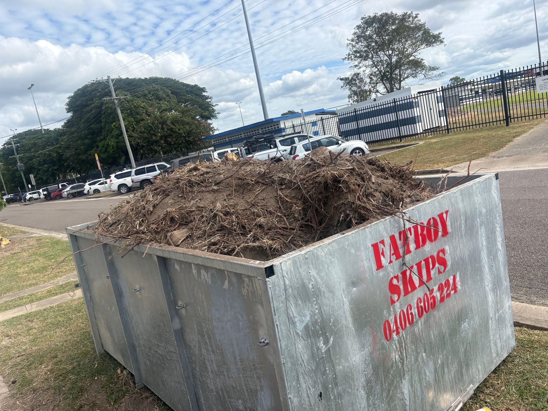 Open Dumpster Overflowing with Broken Bricks and Debris — Fat Boy Skips Townsville In Nome, QLD