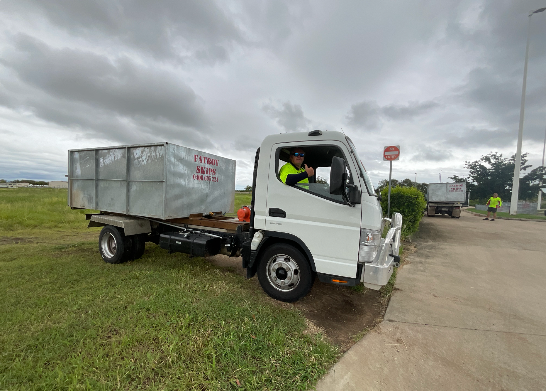 A Yellow Dumpster Filled With Wood — Fat Boy Skips Townsville In Nome, QLD