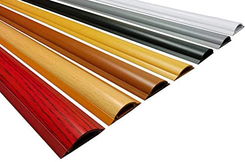 A bunch of different colored pipes are lined up on a white surface.