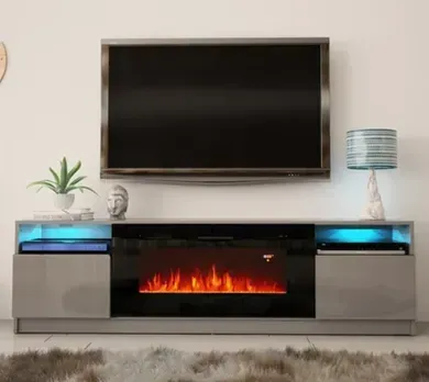 A living room with a fireplace and a flat screen tv.