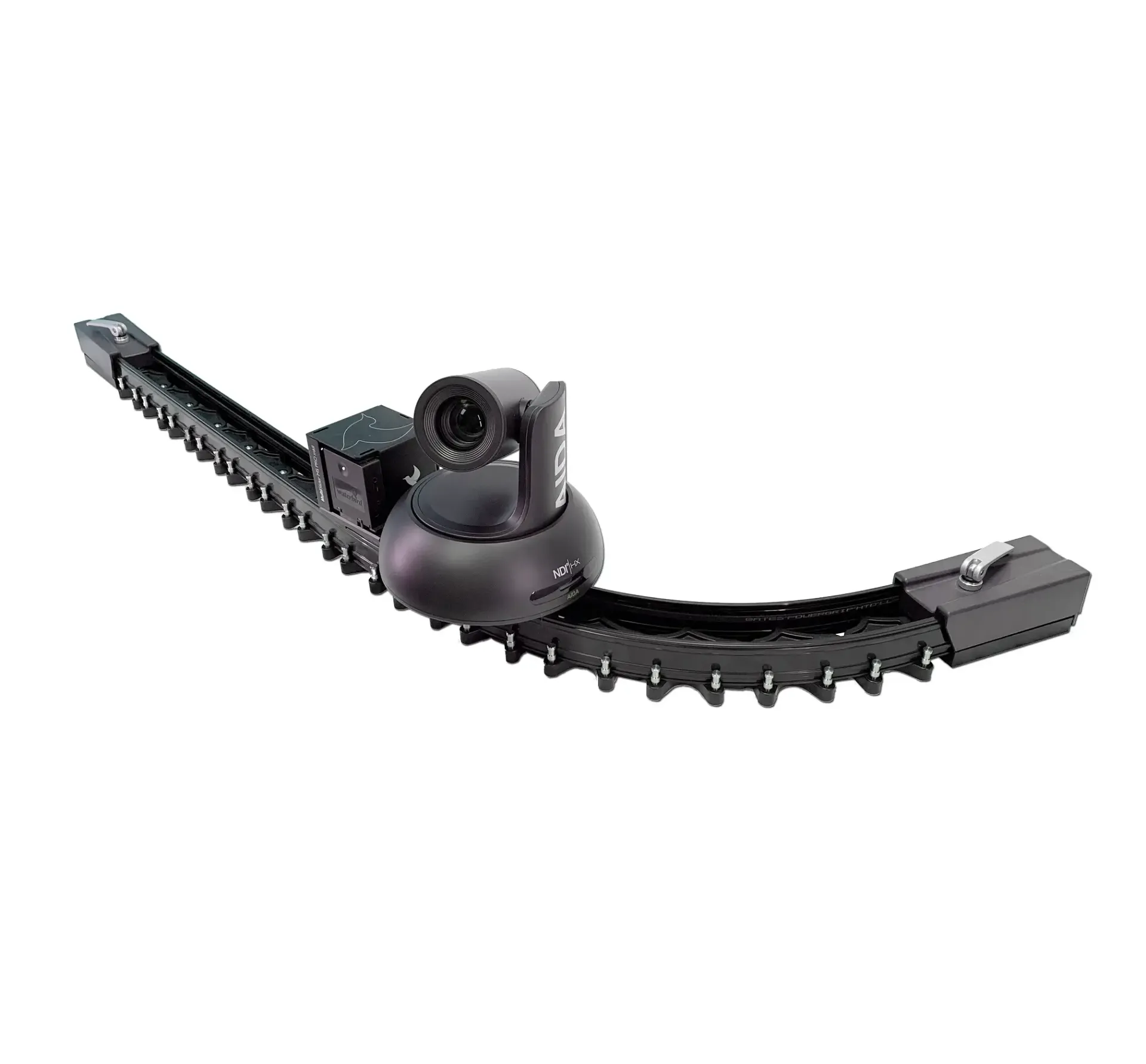 A camera is sitting on top of a conveyor belt on a white background.