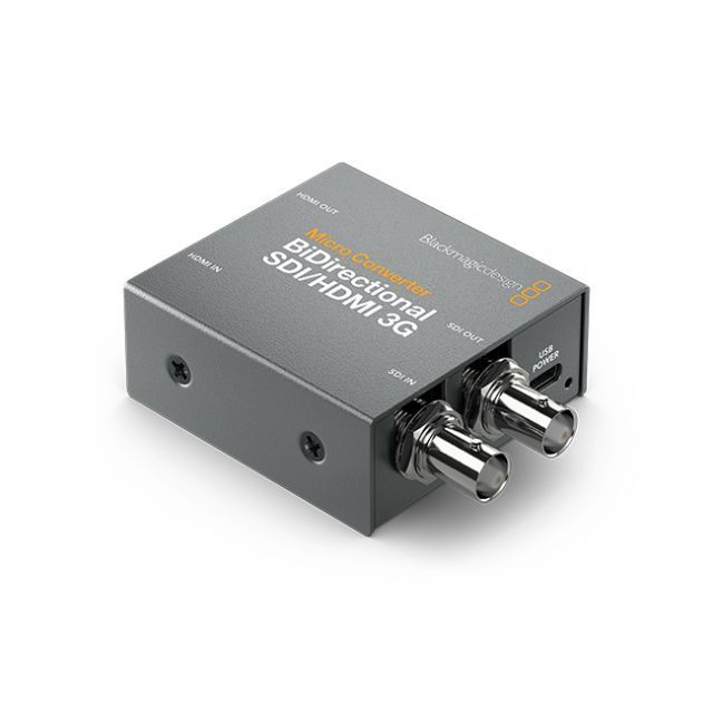 A sdi to hdmi converter is sitting on a white surface.