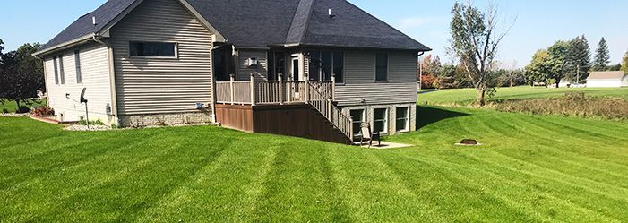 Backyard with healthy lawn