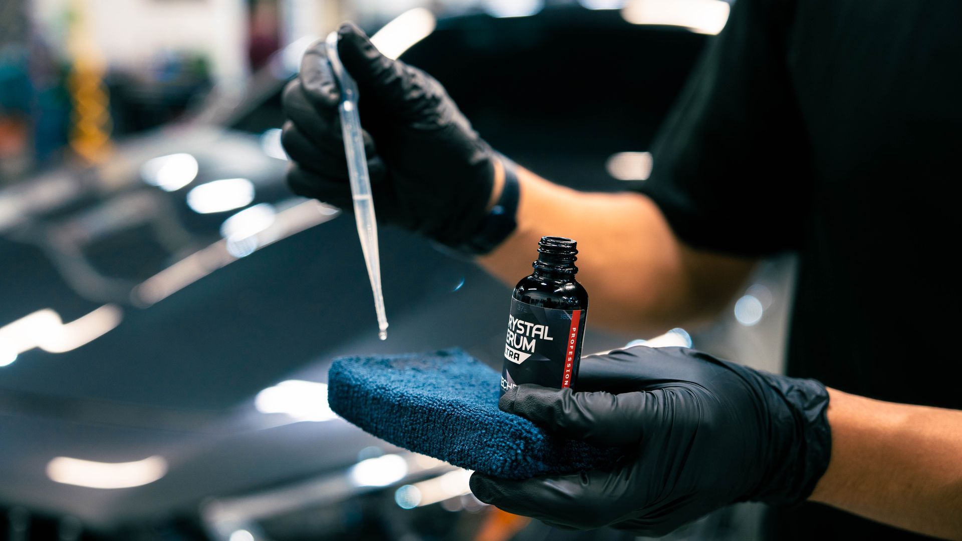 ceramic coating being put onto an applicator