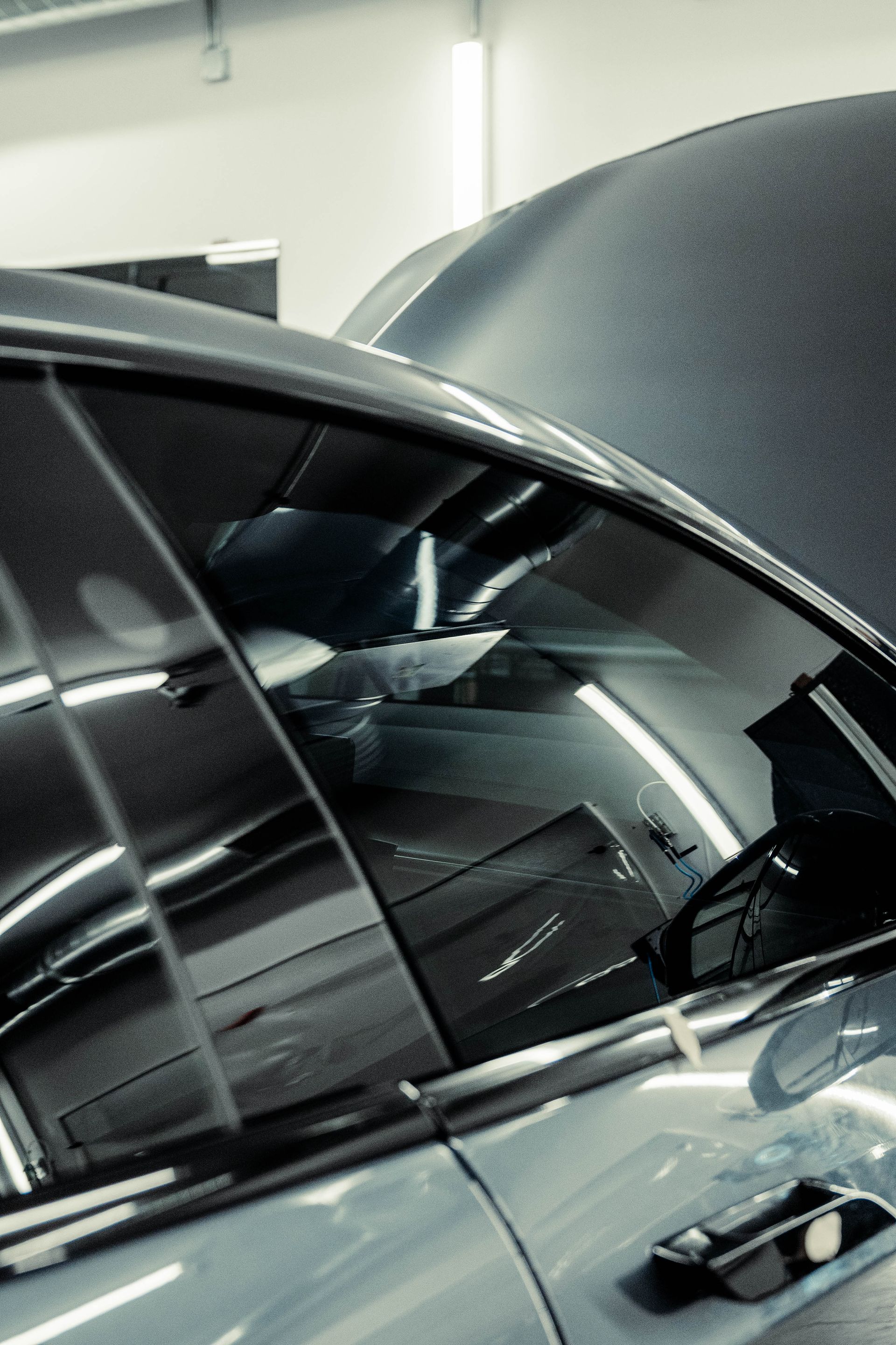a vehicle getting window tint installed by Chicago Auto Pros