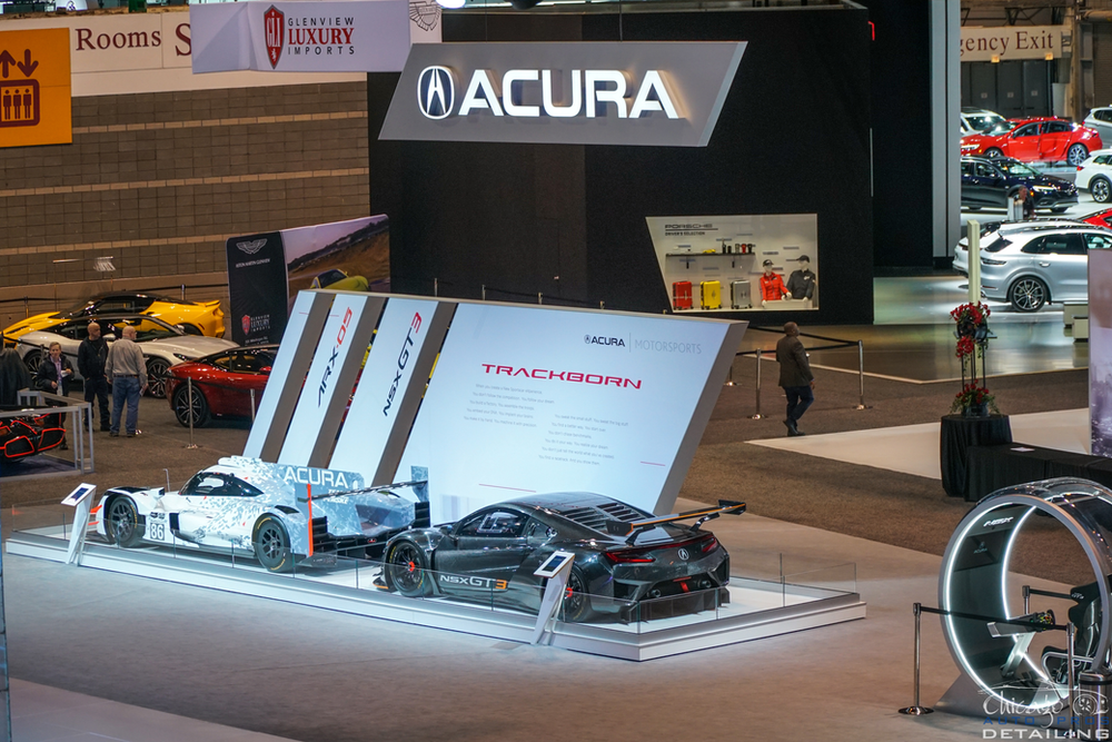 Acura cars are on display at a car show