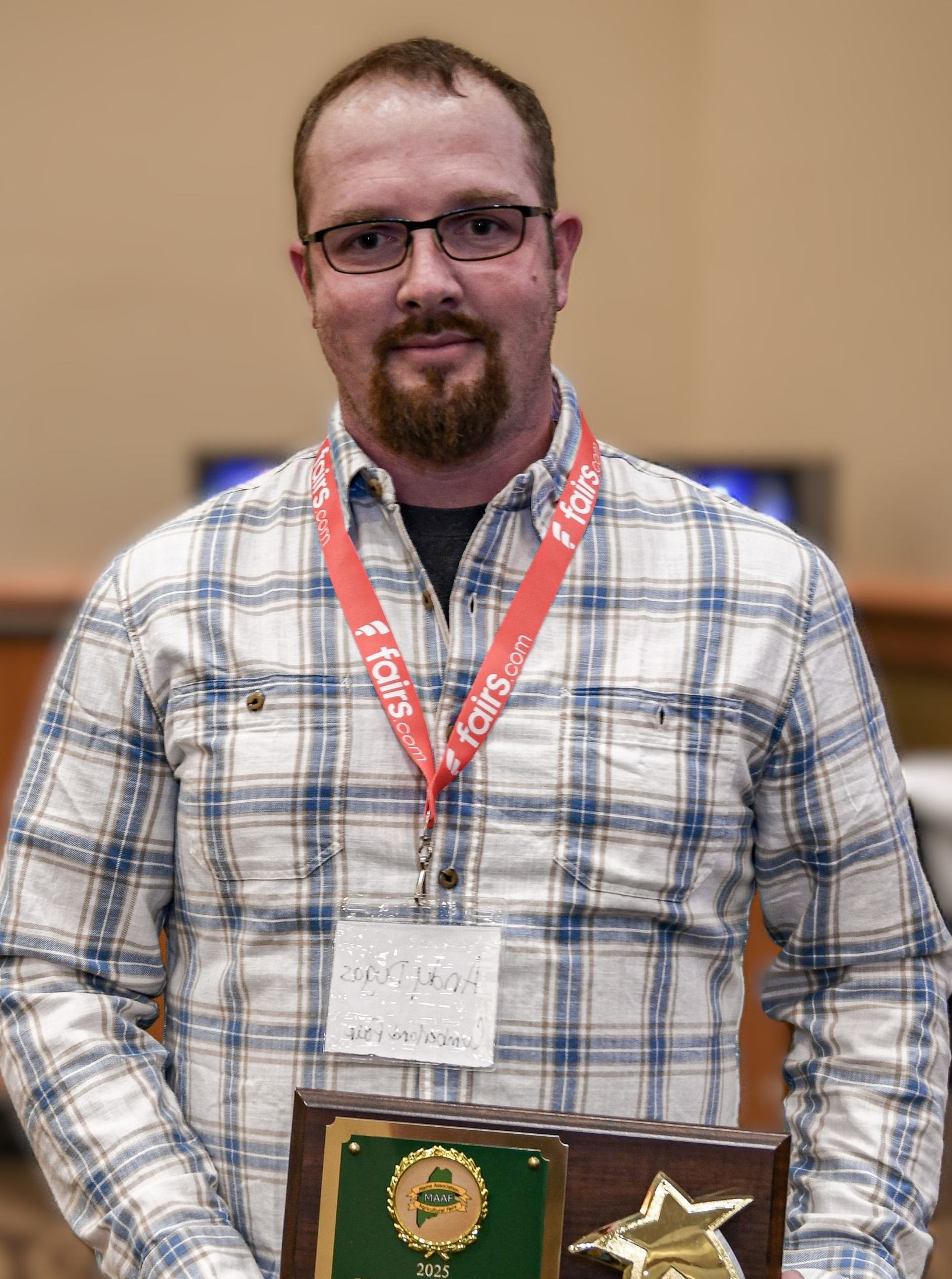one person holding an award
