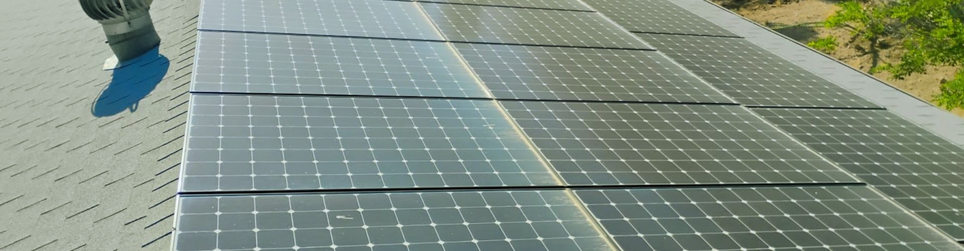 Person walking on solar panels in bright sunlight