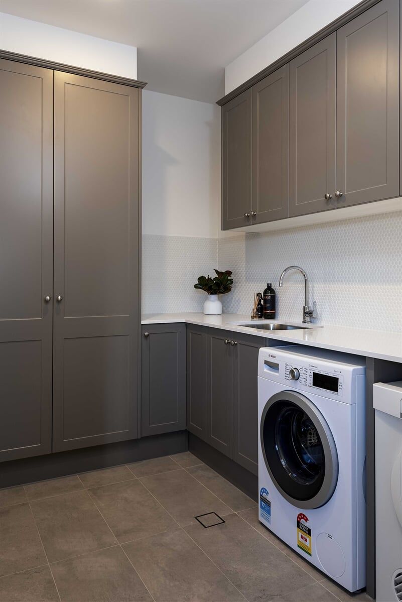 Inviting Laundry Room with Washer and Dryer — Custom Cabinetry in Redhead, NSW
