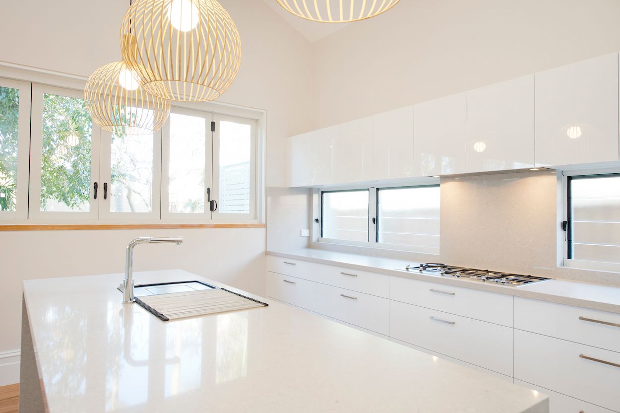 White kitchen with lights