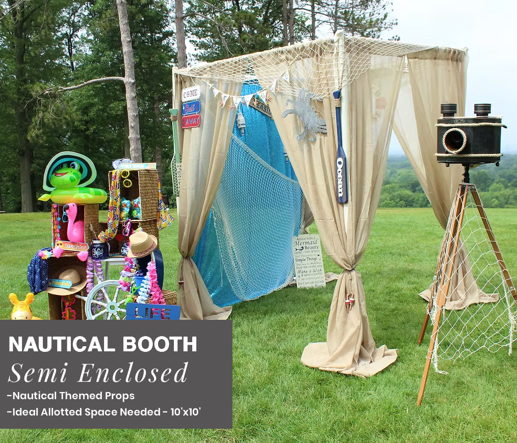 Nautical-themed semi-enclosed photo booth with beige drapes, blue netting, and a vintage camera on tripod outdoors