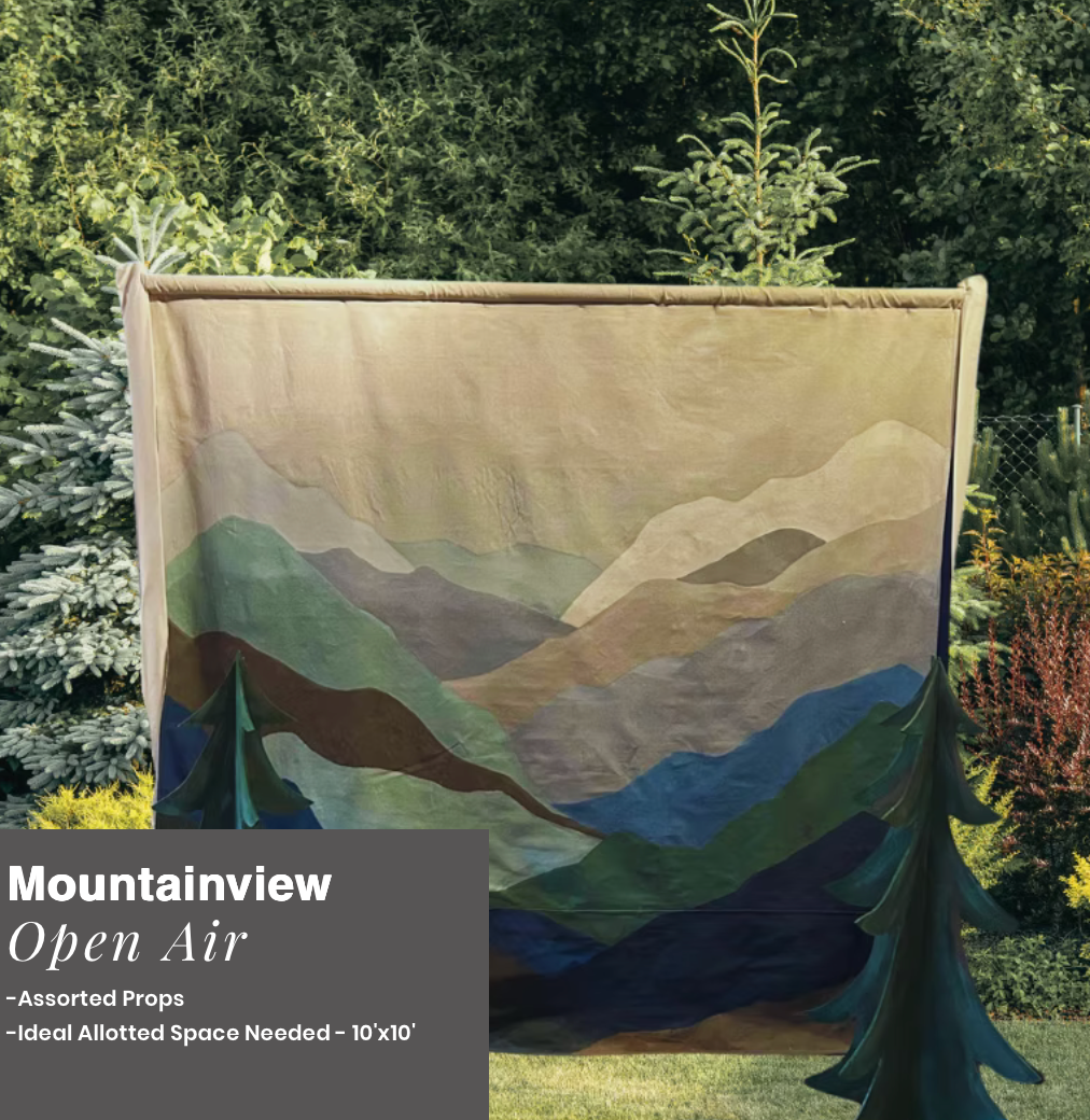 Mountainview Open Air banner with mountain mural and evergreen cutouts outdoors