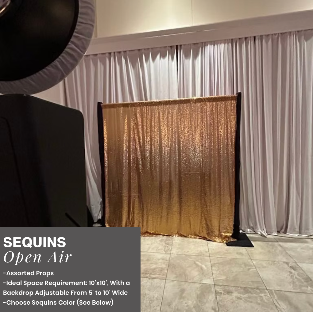 Gold sequin backdrop on a stand in a white-curtained event space with a black lighting rig on the left.