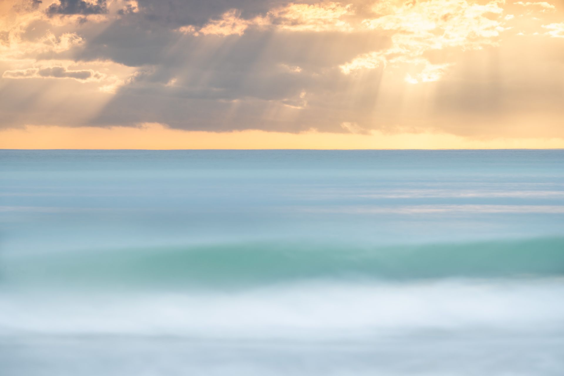 the sun is shining through the clouds over the ocean.  Gulf of Mexico, Anna Maria Island, Brad Burgess Photography, Talking Excitingly