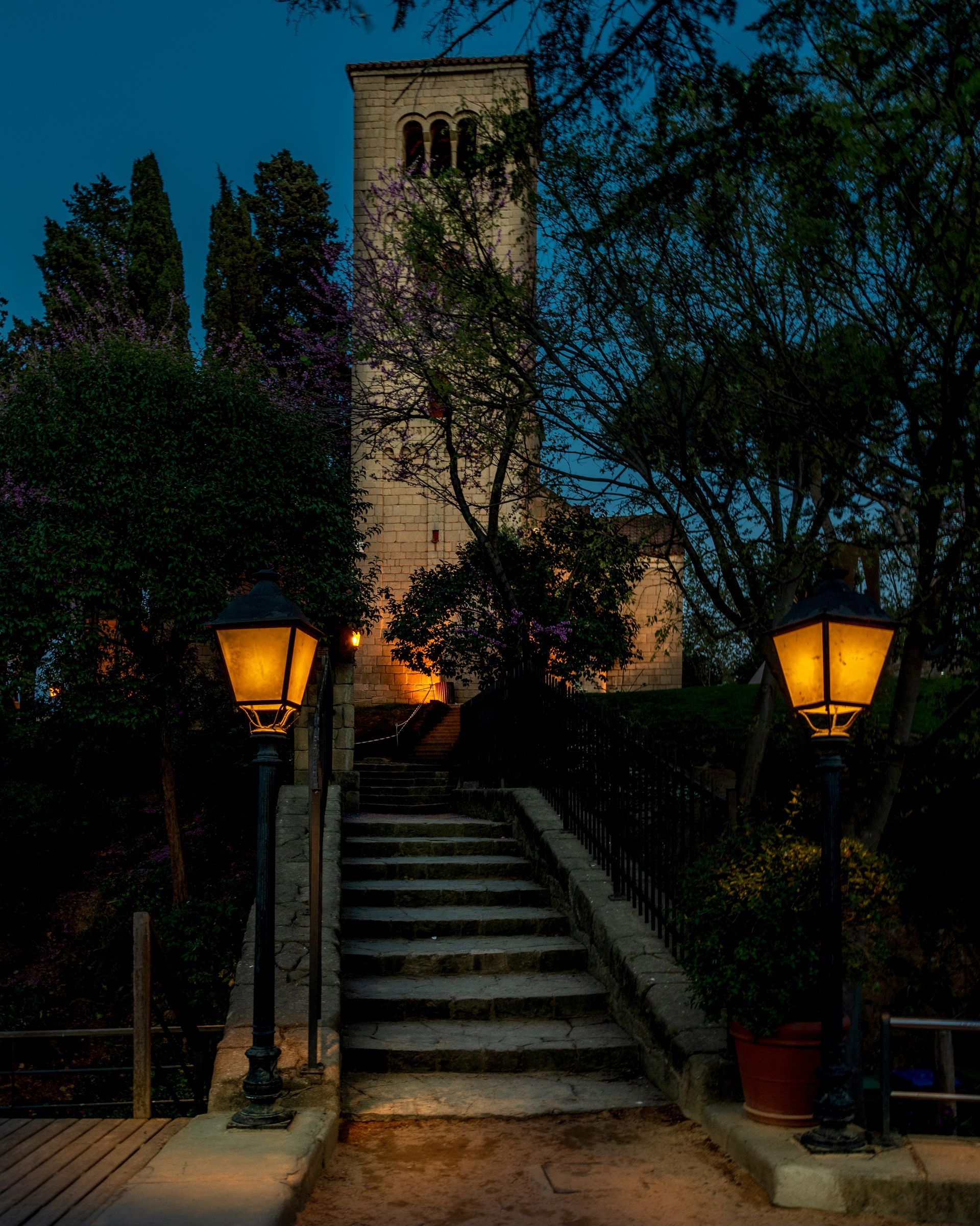a set of stairs leading up to a tower at night.  Talking Excitingly, Brad Burgess Photography