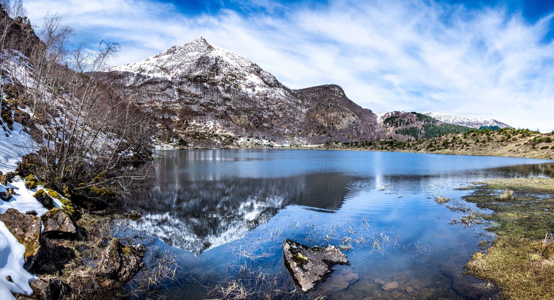 there is a lake in the middle of the mountains with mountains in the background . Estang de Lers, French Pyrenees, Talking Excitingly, Brad Burgess Photography