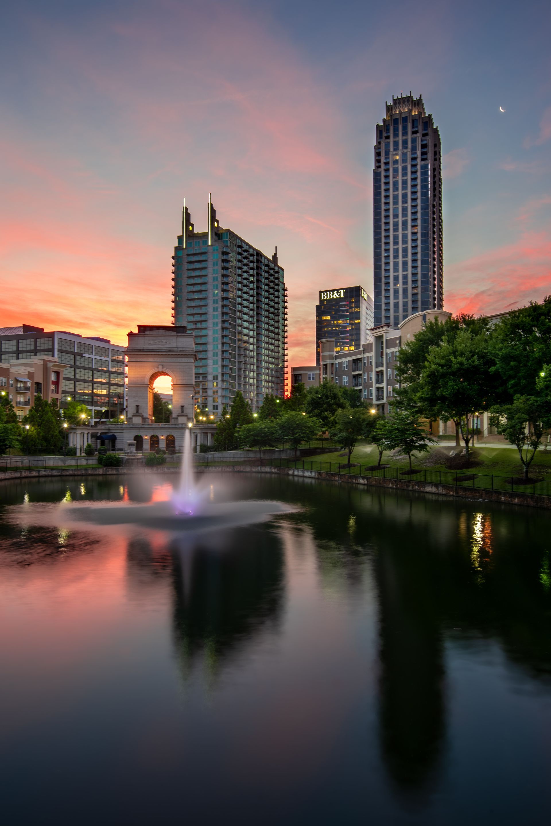 a city skyline with a fountain in the foreground at sunrise. Atlantic Station, Atlanta, Brad Burgess Photogrpahy, Talking Excitingly