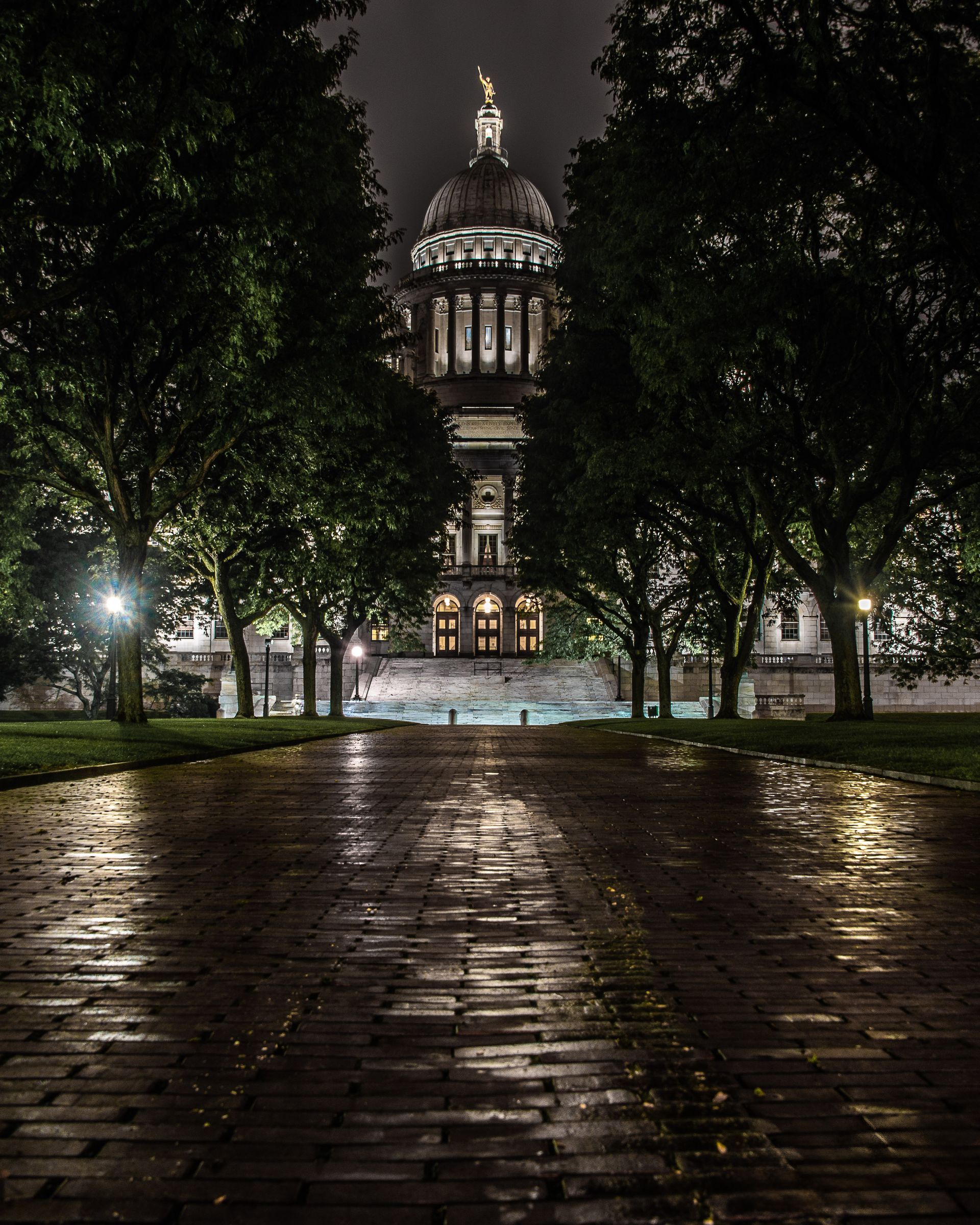 A brick walkway leading to the Rhode Island State House at night.  Brad Burgess Photography, Talking Excitingly