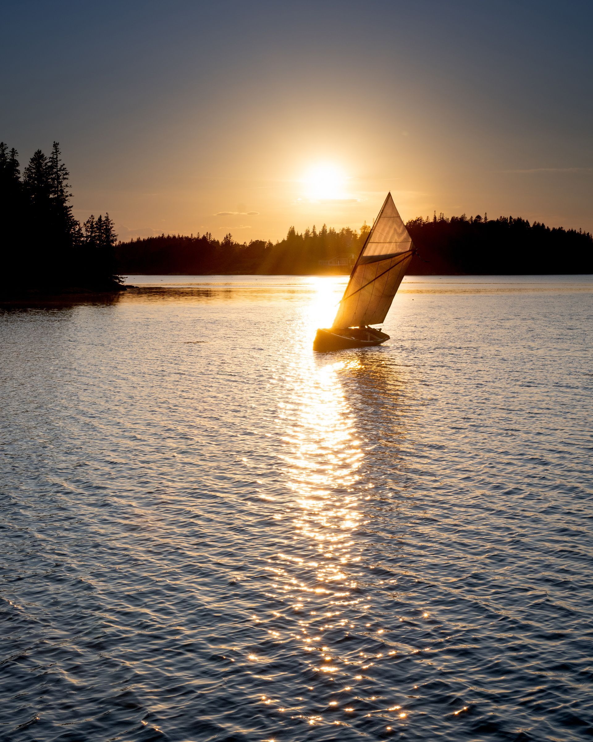 a sailboat is floating on the ocean at sunset. Schooner Stephan Taber, Talking Excitingly, Brad Burgess Photography