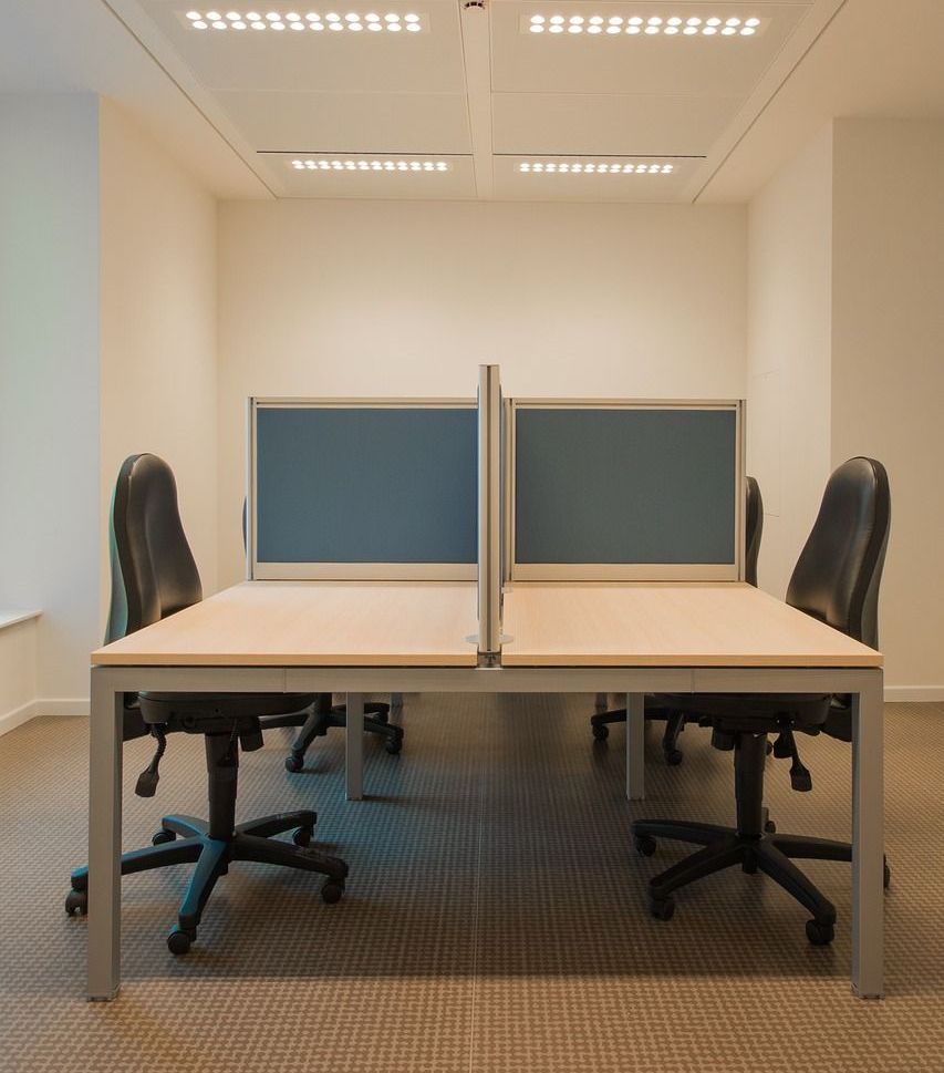 tables and chairs in an office