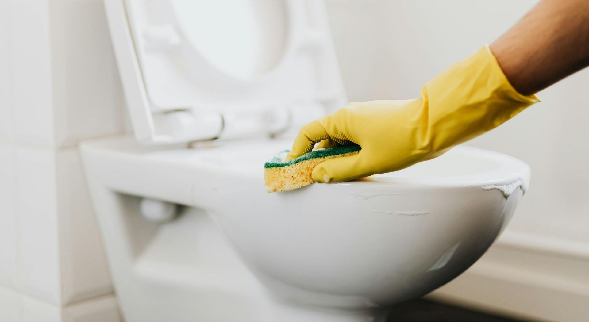 cleaning a toilet